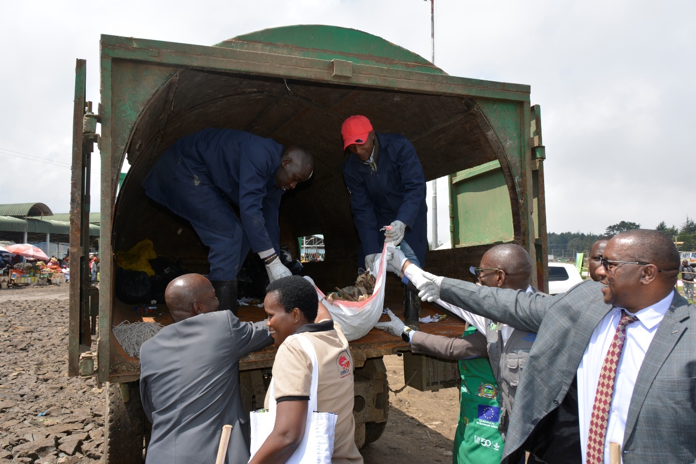 Trash is loaded onto a collection truck. Photo: Fenja Tramsen/ ILRI.