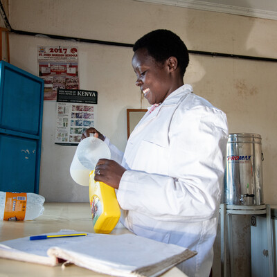 Lilian Satia, a young dairy entrepreneur in Nakuru, Kenya has started a milk bar with other youth (photo credit: ILRI/Georgina Smith).