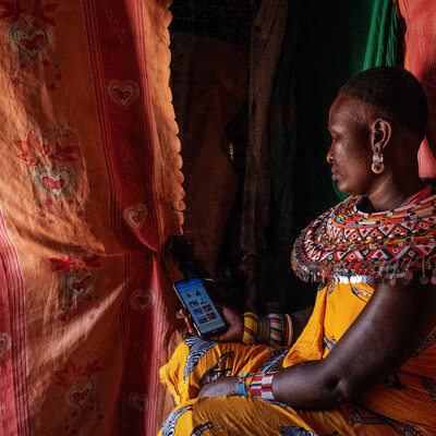 A Samburu mother enters nutrition data into an app (photo caption: ILRI/Kabir Dhanji).