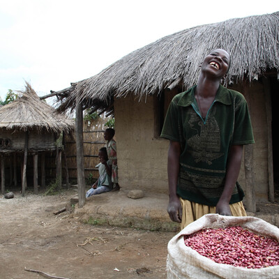 Livestock farmer Jinny Lemson with her bean harvest in central Malawi (photo credit: ILRI).