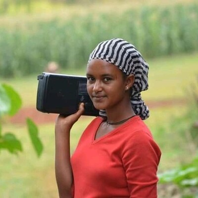 Women farmer in southern part of Ethiopia listening to radio Women farmer in southern part of Ethiopia listening to radio