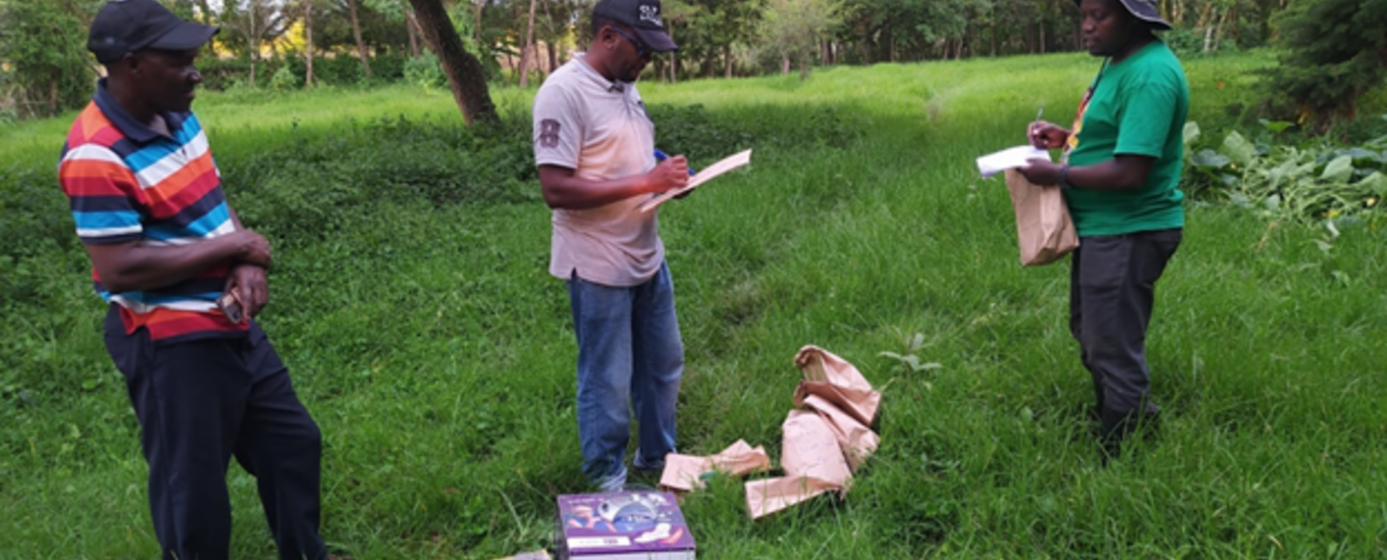 Kennedy Matheka, Jesse and Josiah Rotich at his farm finalising biodiversity assessment and plant sampling (photo: Kelvin Kinuthia/ILRI).